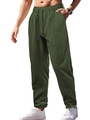 Detail of dark green casual men's trousers featuring a drawstring elastic waistband - S / Bottoms / Army Green