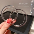 Close-up of double-layered silver geometric hoop earrings with polished metal finish - Silver Double Layer Hoop (12#)