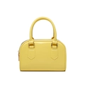 Detail of a bright yellow Boston style jelly bag with high-gloss finish and handles - Yellow