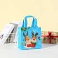 Blue Christmas non-woven gift bag with reindeer pattern standing on a white pedestal - Small / Light Blue