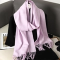 Light purple cashmere-like scarf with tassels styled on a black coat outfit - Taro Purple