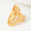 Dubai bridal gold-plated hollow ring with intricate floral engraving and adjustable band - Round Radial Carved Hollow Style