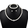 Elegant white pearl jewelry set with necklace bracelet and earrings on black mannequin - Rhinestone Ball 3-Piece Set