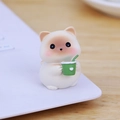Cute white resin cat figurine holding a green heart cup for car and desk decoration - Mini Milk Tea Cat 001B