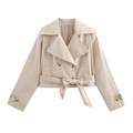 Beige dames trenchcoat met dubbele rij knopen en een ceintuur met strik in de taille - S / Off-wit