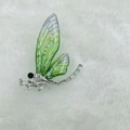 Exquisite silver dragonfly brooch with green wings and sparkling rhinestones - White K Green Dragonfly