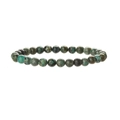 Détail macro du bracelet en perles de pierre naturelle aux textures minérales turquoise et brunes - Pierre de pin africaine