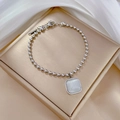 Detail of silver beaded bracelet with square cat's eye stone on elegant jewelry box - Steel Color Square Cat Eye Stone Style (P118 Steel)