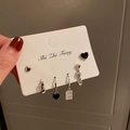 Detail of 5-piece silver heart and black enamel earring set on a display card - Enamel Heart (6-Piece Set)