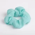 Iridescent light green organza scrunchie with soft pleated texture on white background - Green Solid Gauze
