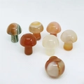 Polished natural agate stone mushroom figurines in various brown and cream patterns - Red Agate