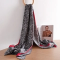 Snake print faux cashmere scarf in black and white with red stripe accents - Red Striped Snake Print