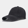 Close-up of the washed black cotton twill baseball cap showing premium fabric texture - Washed Black
