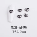 Detailed view of gunblack heart nail charms with BABY engraving and beaded edges - BABY Letter Heart with Beaded Edge (AF06)