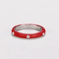 Detailed macro view of S925 sterling silver red enamel ring with white zircon stones - Red