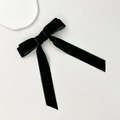 Detailed texture of a dark green velvet bow hair clip with long elegant ribbons - Dark Green