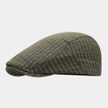 Classic British style plaid flat cap in olive green with breathable woven fabric texture - Adjustable / Green
