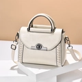 Elegant off-white faux leather handbag with braided sides and swivel lock closure - Gunmetal Lock-White