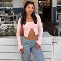Pink cropped cardigan with U-neck and buttons paired with high-waisted wide-leg jeans - S / Pink