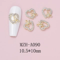 Detailed view of hollow heart nail art charm with gold metal bow and crystals - Gold Hollow Heart Side Bowknot Style (A090)