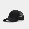 Detailed side view of black trucker hat showing breathable mesh and curved brim - Black/Black Mesh