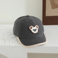Detailed view of grey kids baseball cap with bear patch and beige piped brim - 50-52cm (2-4 Years) / Little White Bear - Grey
