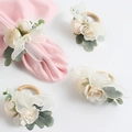 Pastel pink rose napkin ring with rattan loop and pearl accent on pink napkin - Mesh Pearl Rose