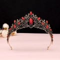 Detailed macro view of baroque crown with red crystals and black rhinestones - Antique Gold Bright Red Crystal Crown