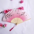Pink silk folding fan with bamboo frame featuring butterfly and floral patterns - Pink Butterfly Floral Style (Smile Women's Fan - 69)