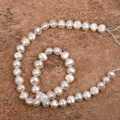 Perle d'acqua dolce barocche bianche da 9-10mm disposte a spirale su una pietra - Bianco Naturale (38cm/40pz)