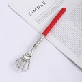 Telescopic back scratcher with silver skull hand and red handle for itch relief - Skeleton Hand Red