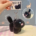Cute black fuzzy cat plush keychain with silver bell and fluffy faux fur texture - Black-Basic