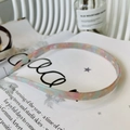 Slim acetate leopard print headband in colorful mosaic pattern on a magazine - Blue and Pink Floral - Glasses Shape