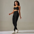 Detail view of high waist textured compression leggings and ribbed sports bra in black - S / Top And Bottom / Cami Bra + Long Pants / Black