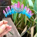 Detailed macro view of pink and blue crystal crown with a silver crescent moon ornament - Sea Blue & Rose Red Crystal with Silver Wire & Moon