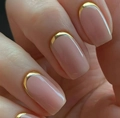 Detailed macro view of nude pink square nails with luxury gold French metallic edges - French Gold Edge Style (With Yellow Jelly Glue)