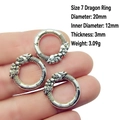 Macro detail of dragon-shaped vintage silver pendant ring with size specifications - 7# Dragon Head Cloud Loop