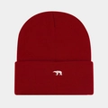 Close-up of white polar bear embroidery on dark red knitted beanie with warm texture - One Size / Burgundy