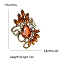 Broche vintage de cristal ámbar en forma de gota dorada, medidas de 7,8 cm por 5,8 cm - Ámbar