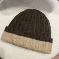 Detailed top-down view of two-tone ribbed knit beanie in coffee and off-white colors - One Size / Dark Brown/Beige Contrast