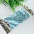 Close-up of 3mm blue acrylic self-adhesive rhinestone stickers for car DIY decoration - 3mm / Aqua