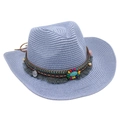 Close-up of blue straw cowboy hat featuring bohemian beaded bands and turquoise accents - Sky Blue