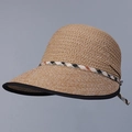 Detail of woven straw hat featuring checkered ribbon trim and black edge contrast - M (56-58cm) / Khaki