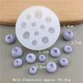 White silicone blueberry mold with 13 cavities and purple fondant sample display - Silicone / Mixed Size Blueberry Mold Semi-transparent