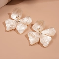 Vintage pearlescent flower stud earrings with diamonds and irregular resin petals - White