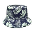 Vue détaillée du chapeau de soleil réversible avec motif tropical sur tissu bleu marine - M (56-58cm) / Bleu marine
