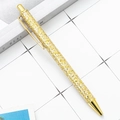 Sparkling gold glitter retractable ballpoint pen with polished metallic clip and accents - Gold Scale (Gold Trim)