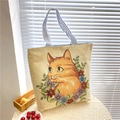 Beige canvas tote bag featuring orange cat and floral embroidery with striped handles - Good Cat