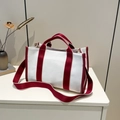 Large red and white canvas tote bag with contrast webbing straps and crossbody shoulder strap - Red