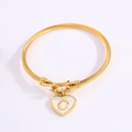 Golden steel wire rope bracelet with heart pendant and letter O charm detail - Letter O